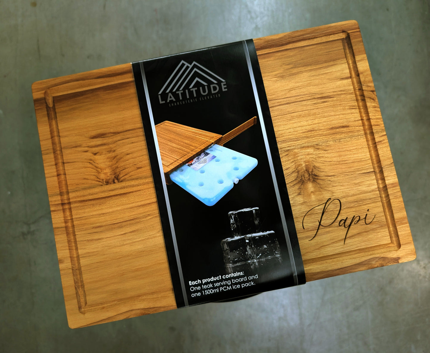 Teak Latitude Board 15x11.5in with Personalized Engraving (+$25).  Estimated delivery 2-3 weeks.